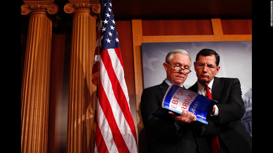 Sessions and Sen. John Barrasso, R-Wyoming, look at a copy of the 2013 budget during a news conference on Capitol Hill in February 2012. Obama&#39;s 2013 proposed budget was criticized by Republicans.