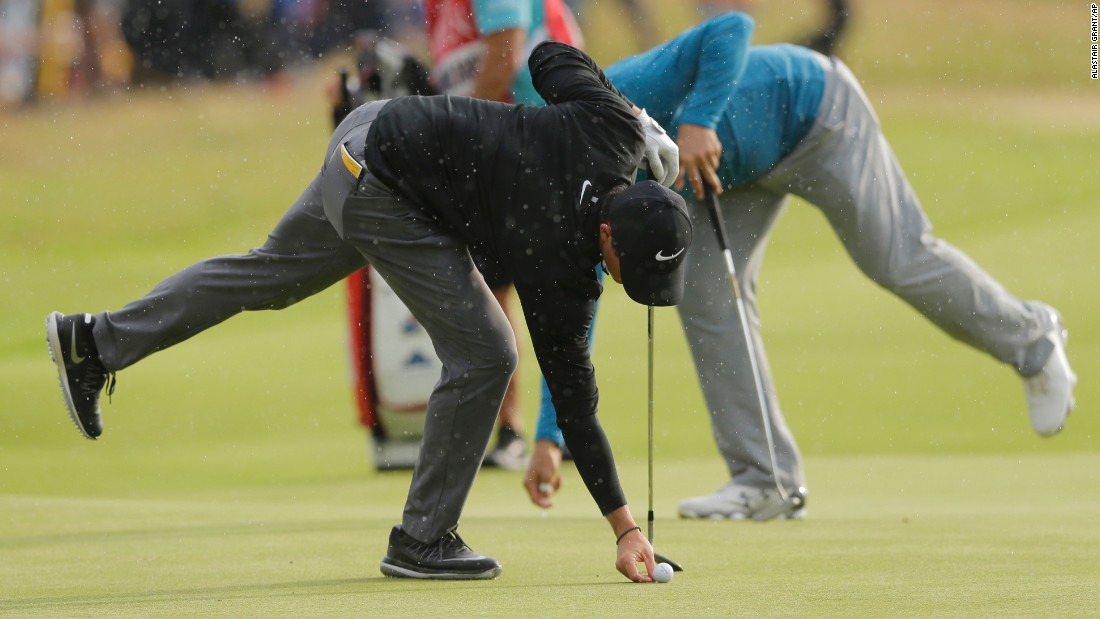 McIlroy, left, and Gary Woodland of the United States gave chase but couldn&#39;t make any inroads into the leaders.