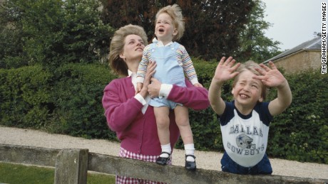 Princes William and Harry with their mother, Diana, in the garden of Highgrove House in Gloucestershire, England in 1986. 