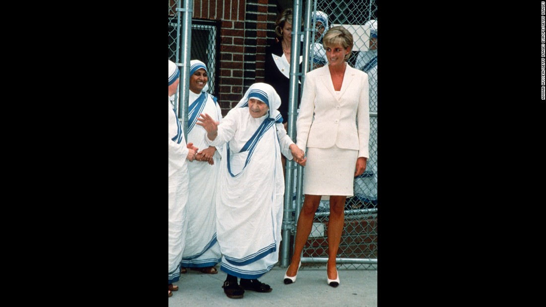Diana holds hands with Mother Teresa after they met in New York in June 1997.
