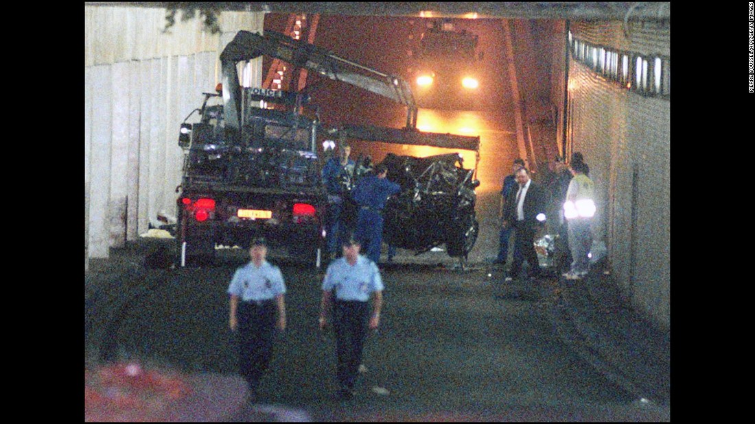 Wreckage is lifted away after the car Diana was in crashed into a pillar on August 31, 1997. Fayed and driver Henri Paul died at the scene. Diana died at a Paris hospital a few hours later. A French investigation concluded that Paul was legally drunk at the time and responsible for the accident. In 2008, a British coroner&#39;s jury found that Diana and Fayed were unlawfully killed because of the actions of Paul and pursuing paparazzi.