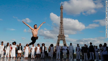 Joudeh performs to &#39;Dance or Die&#39; on the Human Rights Square, near the Eiffel Tower.