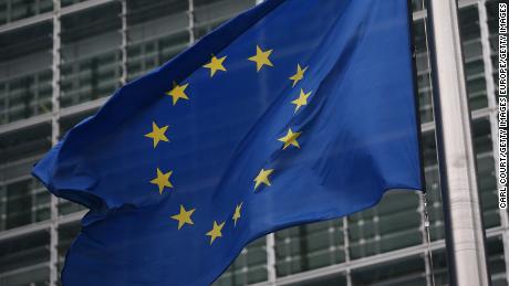 BRUSSELS, BELGIUM - OCTOBER 24:  European Union flags are pictured outside the European Commission building on October 24, 2014 in Brussels, Belgium. Alongside criticism from outgoing European Commission president Jose Manuel Barroso on the UK&#39;s stance on EU immigration and a plan to quit the European Court of Human Rights, the UK has now been told to pay an extra ?1.7bn GBP (2.1bn EUR) towards the EU&#39;s budget because its economy has performed better than expected.  (Photo by Carl Court/Getty Images)