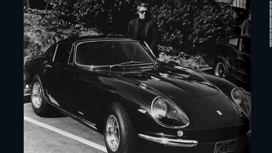 Thanks to a host of celebrity owners, the Ferrari brand was also rapidly building a reputation for elegance and style. Here, Steve McQueen stands proudly beside his Ferrari 275 GTB 4 by Scaglietti. 