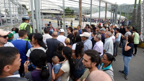 People queue to cast their vote to elect a Constituent Assembly in Caracas on Sunday.