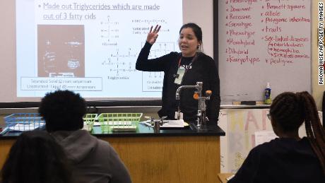 Virginia Escobar-Cheng teaches a science class at a high school in Homestead, Florida, in March. 