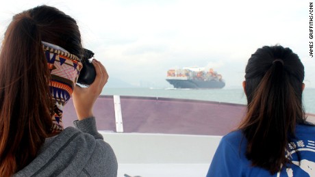 Charlotte Lau and Viena Mak from the Hong Kong Dolphin Conservation Society survey the waters near Lantau Island. 