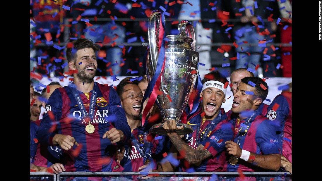 Neymar lifts the trophy after Barcelona won the Champions League in June 2015. It completed a historic treble for the Spanish club, which also won the league and the Copa del Rey that season.