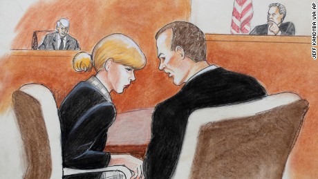 In this courtroom sketch, pop singer Taylor Swift, front left, confers with her attorney as David Mueller, back left, and the judge look on during a civil trial in federal court Tuesday, Aug. 8, 2017, in Denver. Mueller, a former radio disc jockey accused of groping Swift before a concert testified Tuesday that he may have touched the pop superstar&#39;s ribs with a closed hand as he tried to jump into a photo with her but insisted he did not touch her backside as she claims. (Jeff Kandyba via AP)