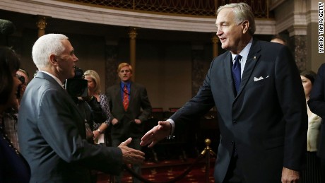 Vice President Mike Pence (L) shakes hands with Alabama&#39;s new Sen. Luther Strange (R-AL) before a mock swearing-in ceremony for Sen. Strange on February 9, 2017, in Washington.