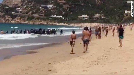 Migrant boat lands on Spanish beach