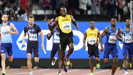 Jamaica&#39;s Usain Bolt pulls up sharply on the final leg of the men&#39;s sprint relay on his track farewell.