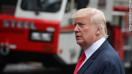 US President Donald Trump walks by as reporters shout questions to him upon his arrival on the South Lawn at the White House on August 14, 2017 in Washington, DC. Later today President Trump will be meeting from Attorney General Jeff Sessions and FBI Director Christopher Wray regarding this weekendÕs events in Charlottesville, Virginia. (Mark Wilson/Getty Images)