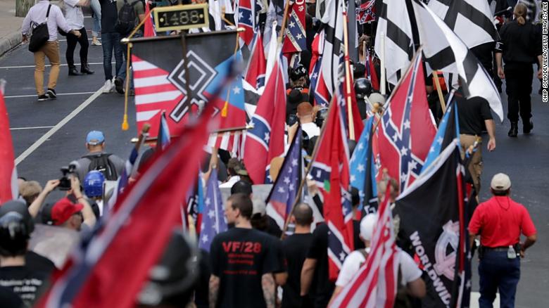 Hundreds of white nationalists, neo-Nazis and members of the &quot;alt-right&quot; march during the &quot;Unite the Right&quot; rally August 12, 2017/