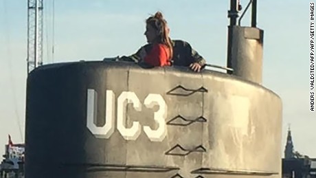 This photo shows allegedly Swedish journalist Kim Wall standing in the tower of the private submarine &quot;UC3 Nautilus&quot; on August 10, 2017 in Copenhagen Harbor.
The submarine sank in the sea outside Copenhagen Harbor on friday night. Following a major rescue operation, a swedish woman supposed to be on board of the submarine is still missing.  / AFP PHOTO / Scanpix Denmark / Anders Valdsted / ALTERNATIVE CROP         (Photo credit should read ANDERS VALDSTED/AFP/Getty Images)