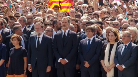 King Felipe VI of Spain leads a moment of silence  in Plaça de Catalunya on Friday.