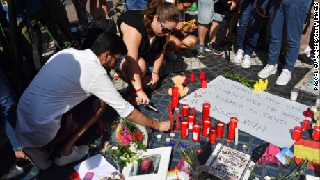 Mourners have begun leaving flowers, candles and heartfelt messages at the spot on Las Ramblas where the attacker&#39;s rampage came to an end.
