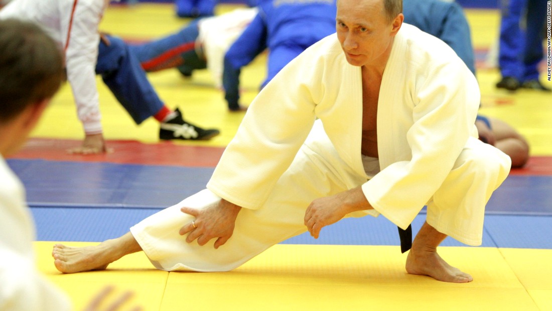 Russian President Vladimir Putin is a judo master, denoted by wearing a black belt. 