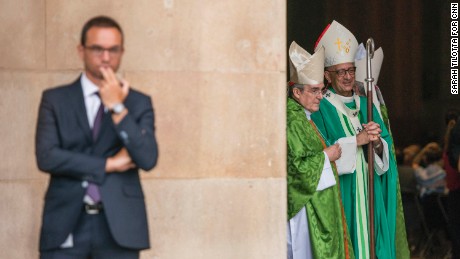 Cardinal Lluís Martínez Sistach, center, speaks with Archbishop of Barcelona, Cardinal Joan Josep Omella, while awaiting King Felipe and Queen Letizia&#39;s arrival.