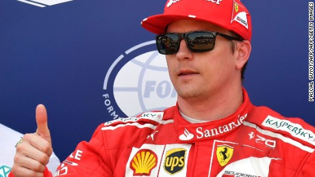 Ferrari's Finnish driver Kimi Raikkonen celebrates after winning the pole position during the qualifying session at the Monaco street circuit, on May 27, 2017 in Monaco, a day ahead of the Monaco Formula 1 Grand Prix.  / AFP PHOTO / PASCAL GUYOT        (Photo credit should read PASCAL GUYOT/AFP/Getty Images)