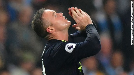 Wayne Rooney celebrates after scoring for Everton against Manchester City.