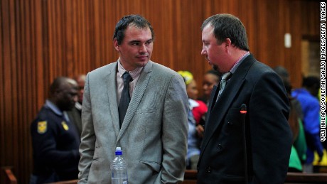 2 men guilty in South Africa coffin assault case 