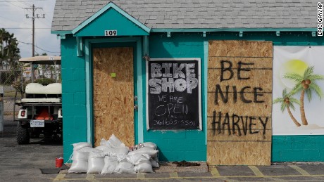 A sign reading &quot;Be Nice Harvey&quot; was left behind on a boarded up business, Thursday, Aug. 24, 2017, in Port Aransas, Texas. Port Aransas is under a mandatory evacuation for Hurricane Harvey. (AP Photo/Eric Gay)