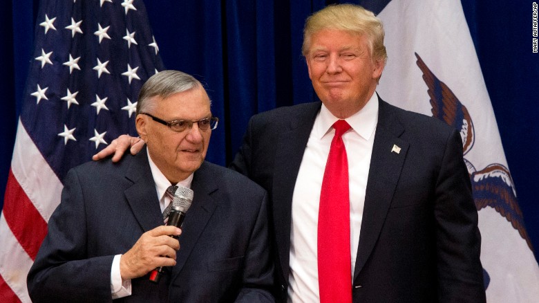 FILE - In this Jan. 26, 2016 file photo, then-Republican presidential candidate Donald Trump is joined by Joe Arpaio, the sheriff of metro Phoenix, at a campaign event in Marshalltown, Iowa. Trump was just a few weeks into his candidacy in 2015 when came to Phoenix for a speech that ended up being a bigger moment in his campaign than most people realized at the time. And now Trump is coming back to Arizona at another crucial moment in his presidency. (AP Photo/Mary Altaffer, File)