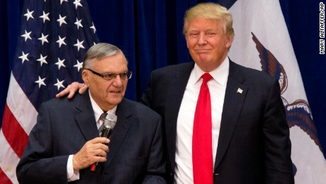 FILE - In this Jan. 26, 2016 file photo, then-Republican presidential candidate Donald Trump is joined by Joe Arpaio, the sheriff of metro Phoenix, at a campaign event in Marshalltown, Iowa. Trump was just a few weeks into his candidacy in 2015 when came to Phoenix for a speech that ended up being a bigger moment in his campaign than most people realized at the time. And now Trump is coming back to Arizona at another crucial moment in his presidency. (AP Photo/Mary Altaffer, File)