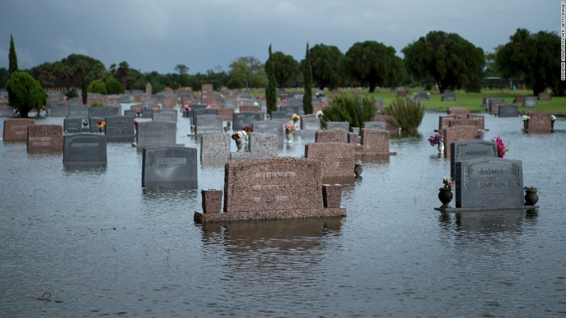 A graveyard is flooded in Pearland, Texas.