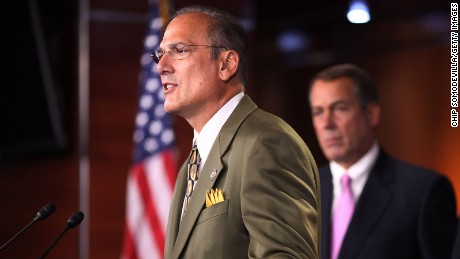 WASHINGTON, DC - SEPTEMBER 23:  Rep. Tom Marino (R-PA) (L) speaks during a news conference about the budget continuing resolution passed by the House near midnight with Speaker of the House Rep. John Boehner (R-OH) (C) and Rep. Lou Barletta (R-PA) September 23, 2011 in Washington, DC. 