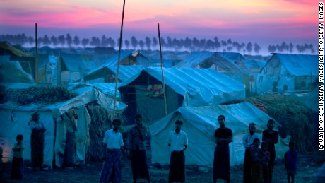 Rohingya refugees stand at a crowded camp in 2012 on the outskirts of Sittwe, Myanmar.