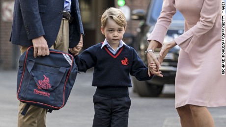 Prince George walks into his new school in south London.