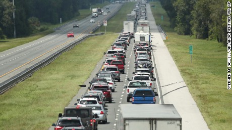 Traffic rolls at a crawl on the northbound lanes of Florida&#39;s Turnpike near the intersection of I-75 in Wildwood, Friday, Sept. 8, 2017. Motorists are evacuating for the anticipated arrival of Hurricane Irma. (Stephen M. Dowell/Orlando Sentinel via AP)