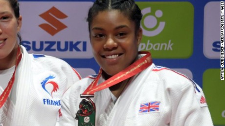Medalists of the womens -57kg category, (L-R) Japan&#39;s Tsukasa Yoshida with the silver, Mongolia&#39;s Sumiya Dorjsuren with the gold, France&#39;s Helene Receveaux and Great Britain&#39;s Nekoda Smythe-Davis with the bronze celebrate on the podium during the medal ceremony at the World Judo Championships in Budapest on August 30, 2017.   / AFP PHOTO / ATTILA KISBENEDEK        (Photo credit should read ATTILA KISBENEDEK/AFP/Getty Images)
