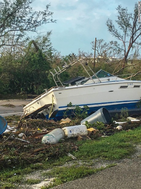 This image released by the Monroe County Board of County Commissioners shows debris along the Overseas Highway in the Florida Keys, Fla., Monday, Sept. 11, 2017. Recovery along the island chain continues after Hurricane Irma made landfall on Sunday as a Category 4 hurricane then. (Sammy Clark/Monroe County Board of County Commission via AP)