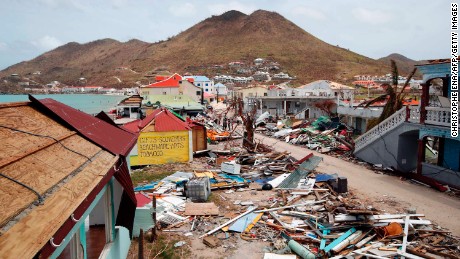 This general view shows buildings destroyed by Hurricane Irma on the French Caribbean island of Saint Martin on September 12, 2017, during the visit of France&#39;s President Emmanuel Macron . 
French President Emmanuel Macron and British Foreign Secretary Boris Johnson travelled Tuesday to the hurricane-hit Caribbean, rebuffing criticism over the relief efforts as European countries boost aid to their devastated island territories. / AFP PHOTO / POOL / Christophe Ena        (Photo credit should read CHRISTOPHE ENA/AFP/Getty Images)