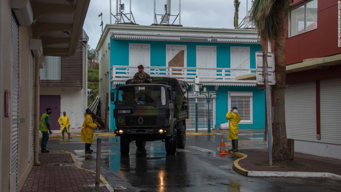 Soldiers patrol a street in Marigot, St. Martin, as preparations were made for Maria on September 19.