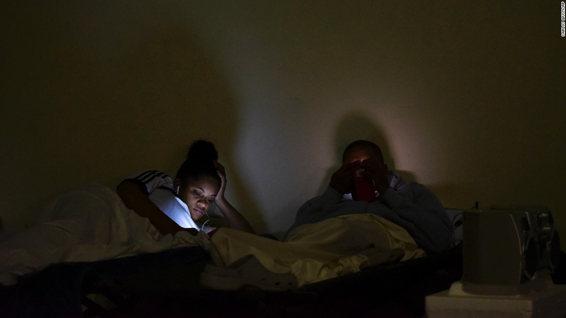 People take shelter at Puerto Rico&#39;s Humacao Arena on Tuesday, September 19.