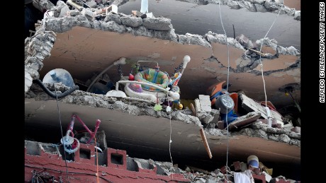 Children's toys are seen in a building flattened by the quake in Mexico City on September 20.