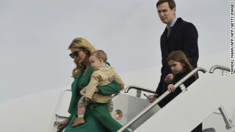 TOPSHOT - US President-elect Donald Trump&#39;s daughter Ivanka Trump, her son, her husband Jared Kushner and daughter Arabella, step off a plane upon arrival at Andrews Air Force Base in Maryland on January 19, 2017.  / AFP / MANDEL NGAN        (Photo credit should read MANDEL NGAN/AFP/Getty Images)