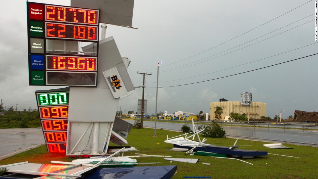 A gas station&#39;s sign is damaged in Punta Cana, Dominican Republic, as the hurricane passed just north of the country on September 21.