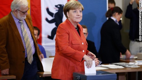 Merkel gets fourth term but German voters deliver far-right surge