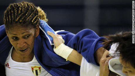 Cuba&#39;s Driulis Gonzalez (L) and Chinese Taipei Chin-Fang Wang compete during their women&#39;s -63kg judo match of the 2008 Beijing Olympic Games on August 12, 2008 in Beijing.     AFP PHOTO / OLIVIER MORIN (Photo credit should read OLIVIER MORIN/AFP/Getty Images)