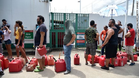 People wait in line to buy gas in Bayamón, Puerto Rico. 