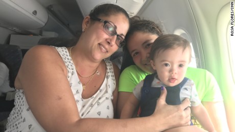 Lydia Acevedo, her year-old grandson Mateo and her daughter
Nayelys aboard the evacuation flight.