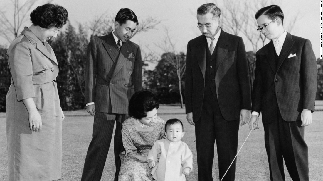 Members of the Japanese imperial family are photographed in 1961. Akihito is second from left, looking at his wife and their first son, Naruhito. They are joined by Akihito&#39;s parents, Emperor Hirohito and Empress Nagako, and his brother Masahito.