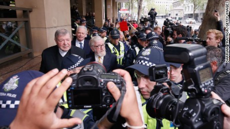 Cardinal George Pell leaves the Melbourne Magistrates&#39; Court with a heavy Police escort on October 6 in Melbourne.