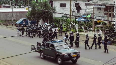 Cameroon police officials with riot equipment patrol in Buea, in Cameroon&#39;s Southwest Region, on October 1, 2017.
