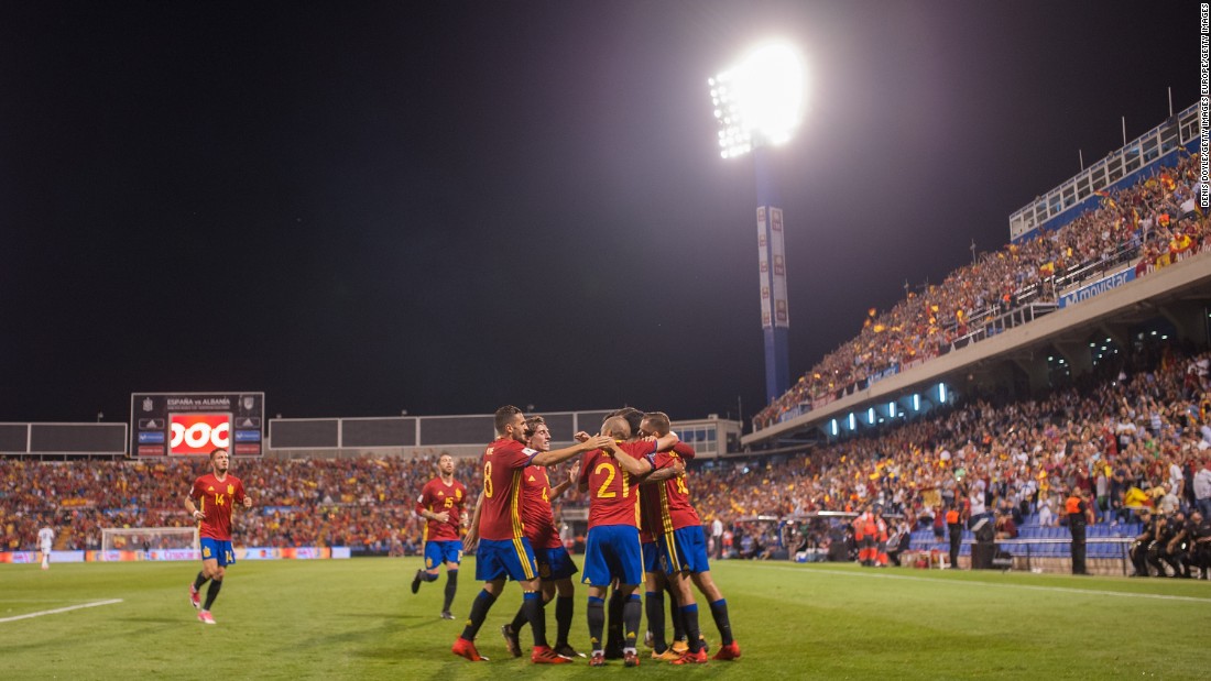 Amid the furore of Catalonia&#39;s disputed independence referendum, Spain went undefeated and qualified from Group G of European qualifying with a match to spare after beating Albania 3-0.